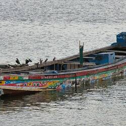 Pirogue as water taxi between islands