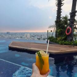 Drinking overpriced but delicious freshly squeezed passion fruit juice