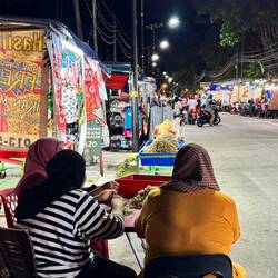 Teluk Nipah at night. Three ladies doing some fishy things.
