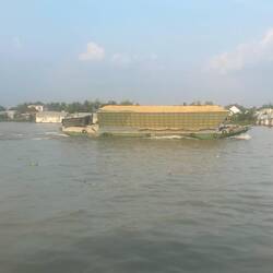 Big boat full of grain I think