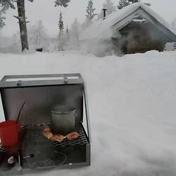 Gasoline stove making another cup of coffee! And melting some frozen buns.