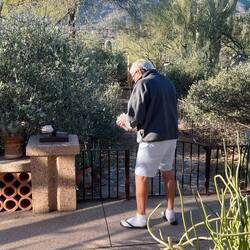 Alain feeding the quail.