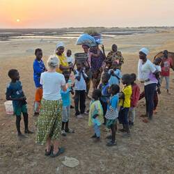 We spend the night next to some salt pans. Within minutes we are surrounded by locals