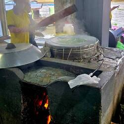 That's a real wood fire, on a wooden boat. Good thing they're afloat 😊