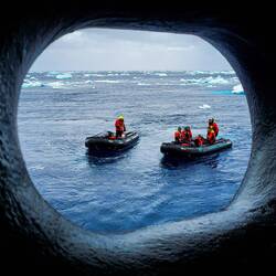 Zodiacs waiting to be brought back aboard — Weddell Sea, Antarctica.