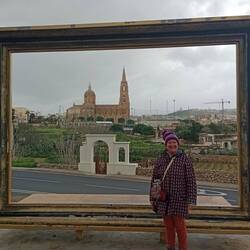 Gozo's frame, with a view of Ghajnsielem Parish Church