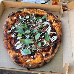 Mamani pizza cooked in ooni