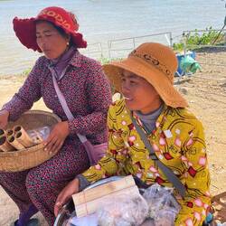 Bamboo rice from the ladies. Liked their colourful shirts.