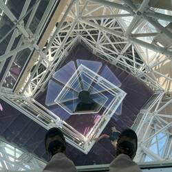 In the center of the library, was a small glass floor where you could see down through the stairway.