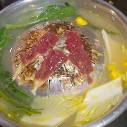 Cooking our meal at the table