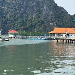 Here's the soccer field, with blue flooring. The island's school has the orange roof.