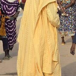 The dignitary glides over the market