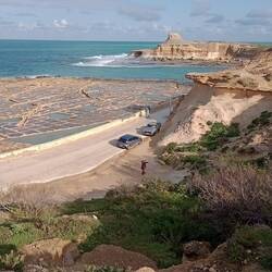 Me at the cache, Oliver at the car, near Xwejni salt pans