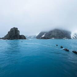 Zodiacs returning to Ortelius ... waiting to be hauled up — Elephant Island, South Shetlands.