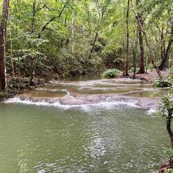 Mata Jitu falls. The stone is green marble deposited from the water over Millenia