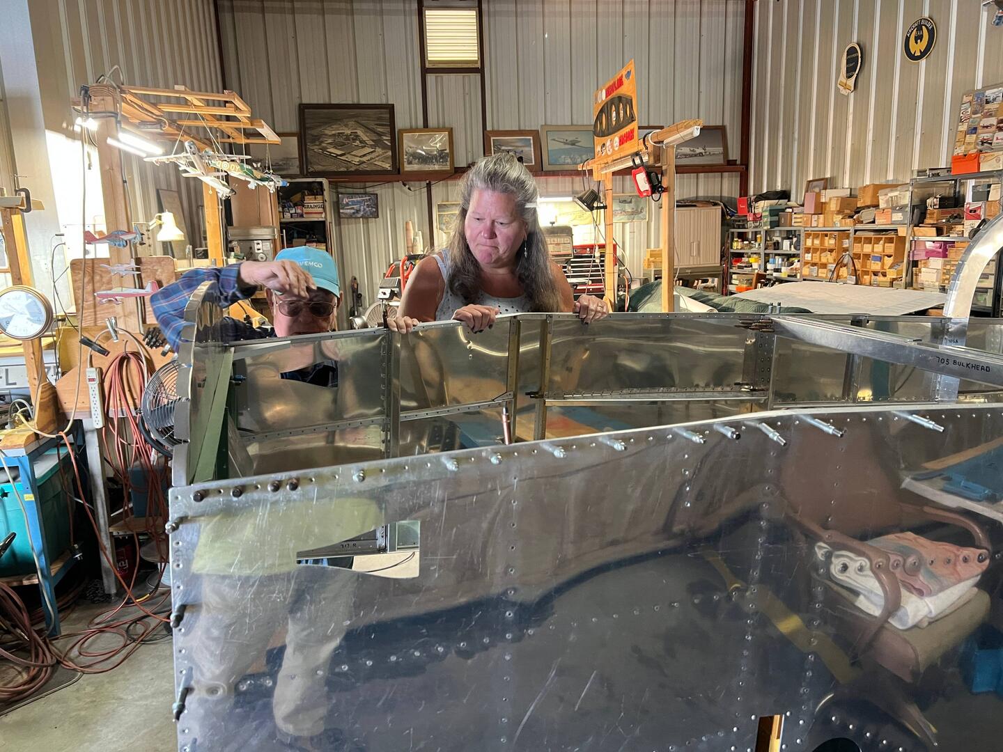 Rosanne checking out dad's work