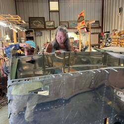 Rosanne checking out dad's work