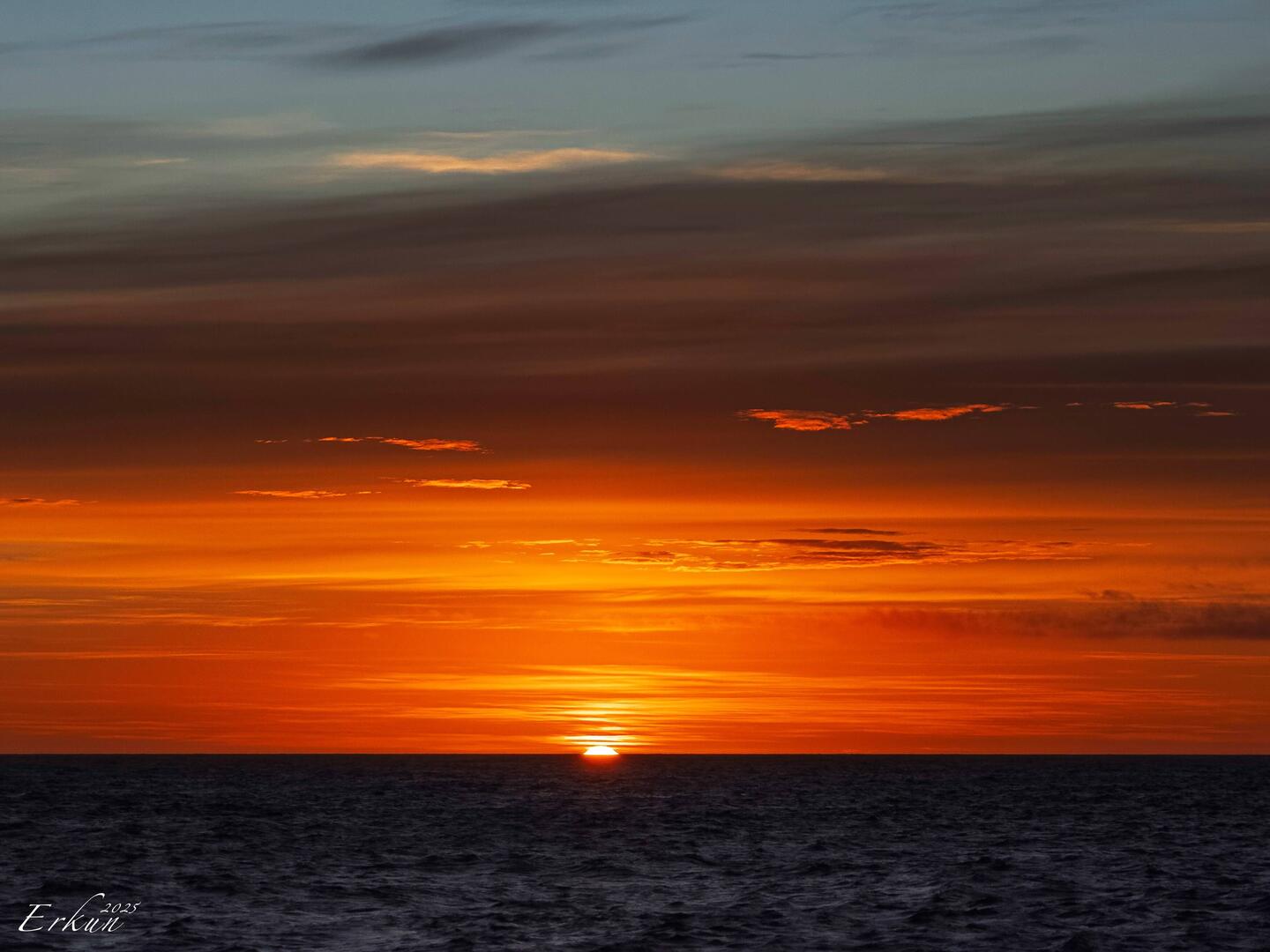 A colorful sunrise greets us on our second day in the Drake Passage.