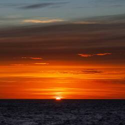 A colorful sunrise greets us on our second day in the Drake Passage.
