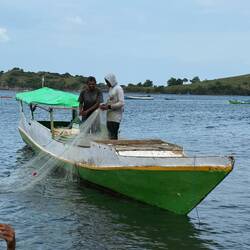 Pulling in the nets right at the beach