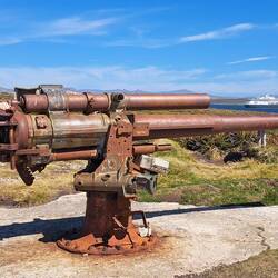 WW2 remnant: British QF 4-inch Mark IV naval gun installed for harbor defense.