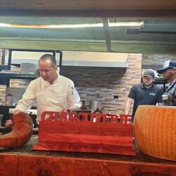 Chefs preparing a sampling surprise for us