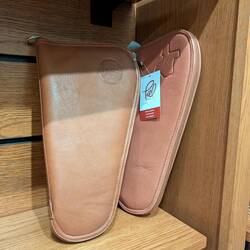 TX branded gun cases at the gift shop in the Capitol