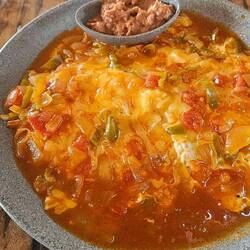 Best Huevo Rancheros ever! Waitress said to Tim..."the usual?". You know it's good!!