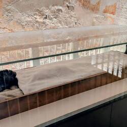 Tut's mummy left in place. When they tried to move it, they broke his toes and "manhood"