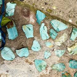 The blue volcanic stones on the beach