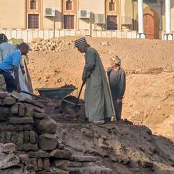 Excavating just in front of the mosque