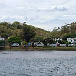 Caravans just parked on the riverbank