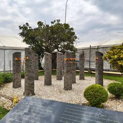 Belgium Memorial: 10 pillars, one for each man killed.