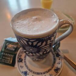 Tea with milk.....more like hot milk with tea bag