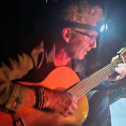 Michel played beautiful guitar