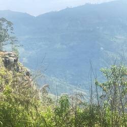 Small people atop Ella Rock
