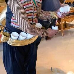 Greeter at our Dead Sea hotel with a refreshing beverage