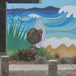 Random kiwi painting on a public toilet