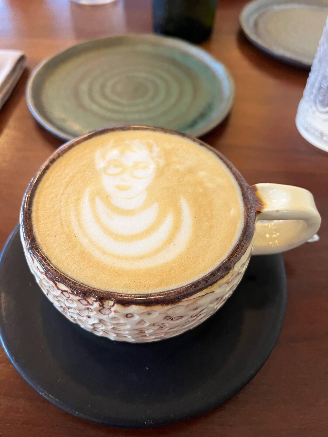 The barista drew a photo of me in the coffee this morning