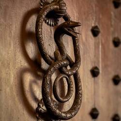 An antique door knocker — Bologna, Italy.