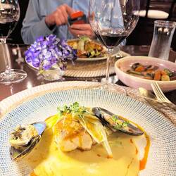 Sea bass in coconut seafood cream sauce