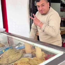 Street vendor making us a snack