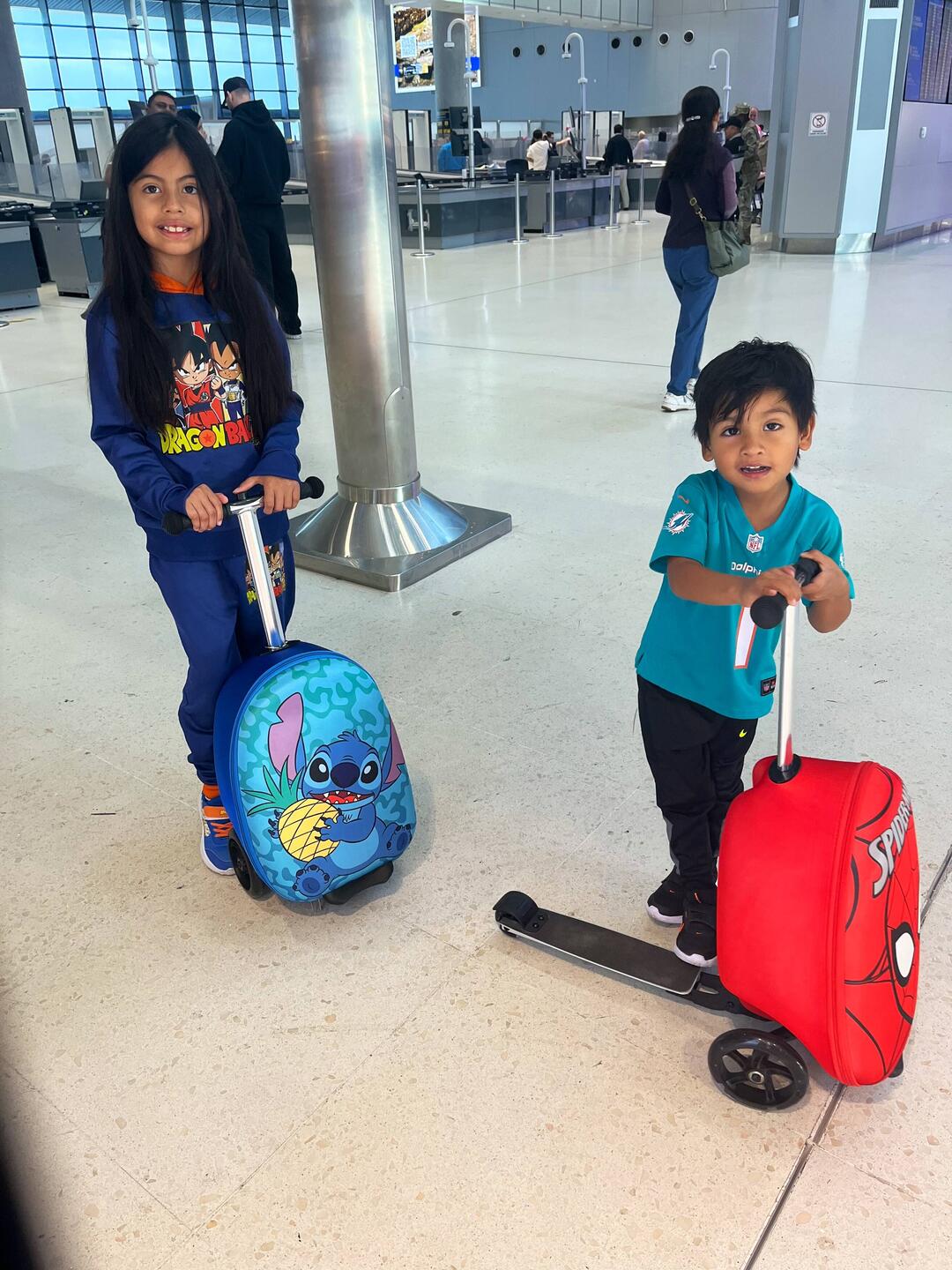 Travel bags with attached scooters -- i need one!