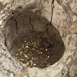 The time honored tradition of throwing coins in a well ... Biblioteca Salaborsa — Bologna, Italy.