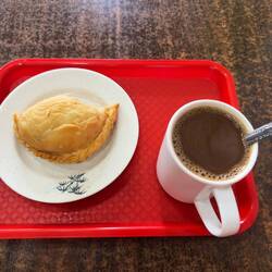 My post-exploration snack of a curry puff and a coffee.