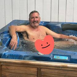 Tom enjoying the private hot tub at The Sands