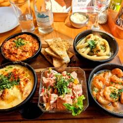 All sorts of seafood - crab, scallops, squid, ceviche, shrimp. So good.