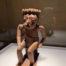 Pre-Columbian shaman at the Gold Museum. Note cheek bulging with coca & trance-like eyes