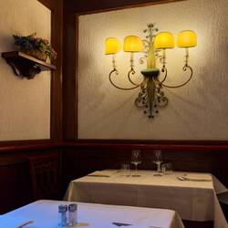 Cozy dining room at Trattoria Leonida — Bologna, Italy.