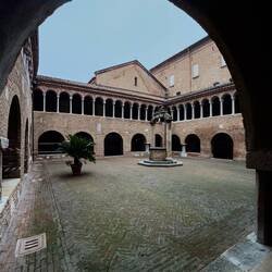 The cloister of the Benedictine Monastery — Bologna, Italy.